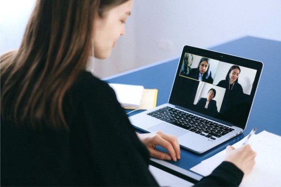 Remote team using internal communication tools for meeting